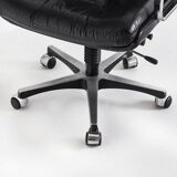 Vintage leather armchair. Swivel, on casters, multi-position. Norway, 1970s.