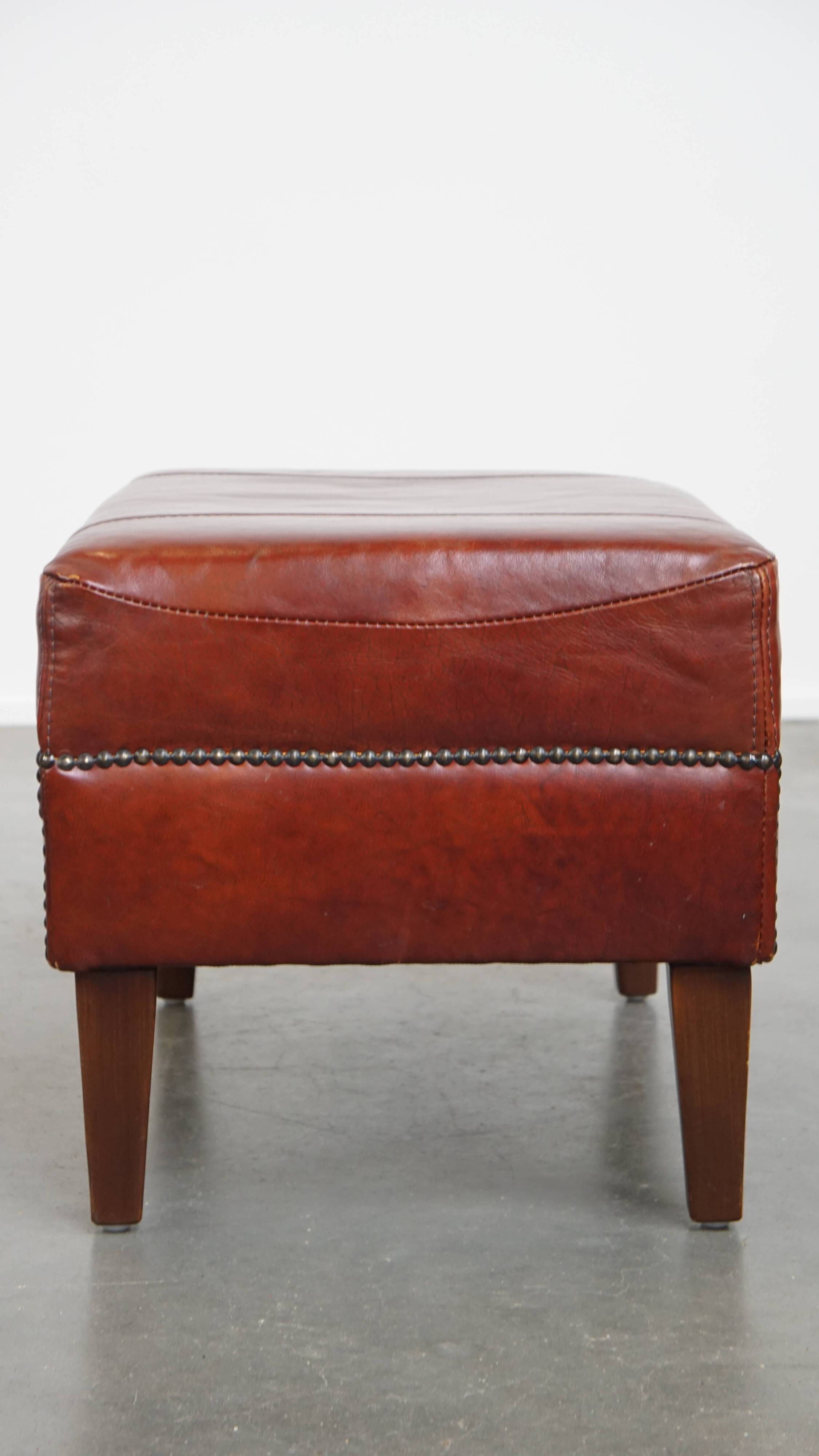 Ottoman couleur cognac en cuir de vachette