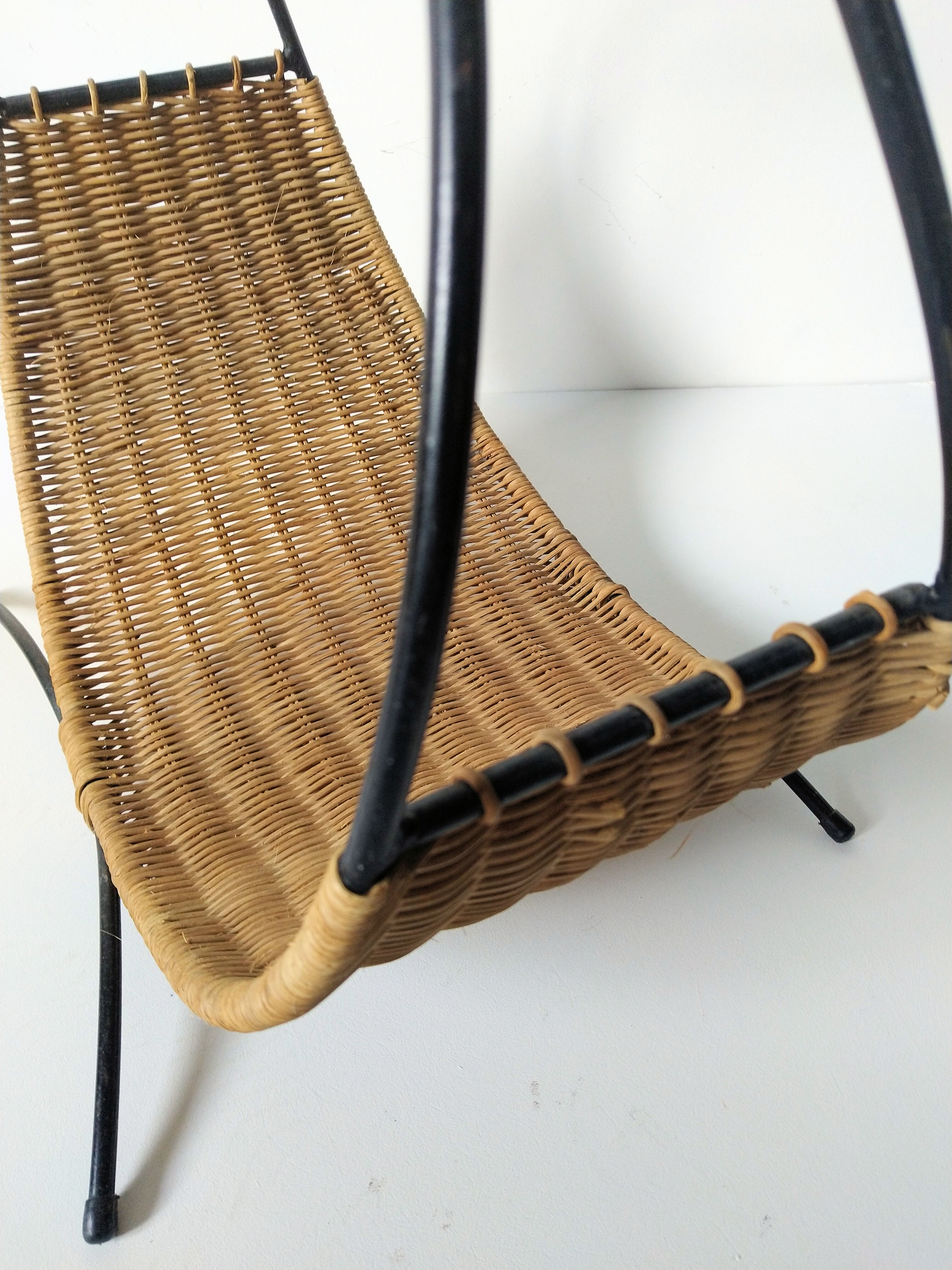 Rattan basket with logs