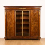 Important flamed mahogany library in Empire style from around 1900.