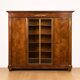 Important flamed mahogany library in Empire style from around 1900.