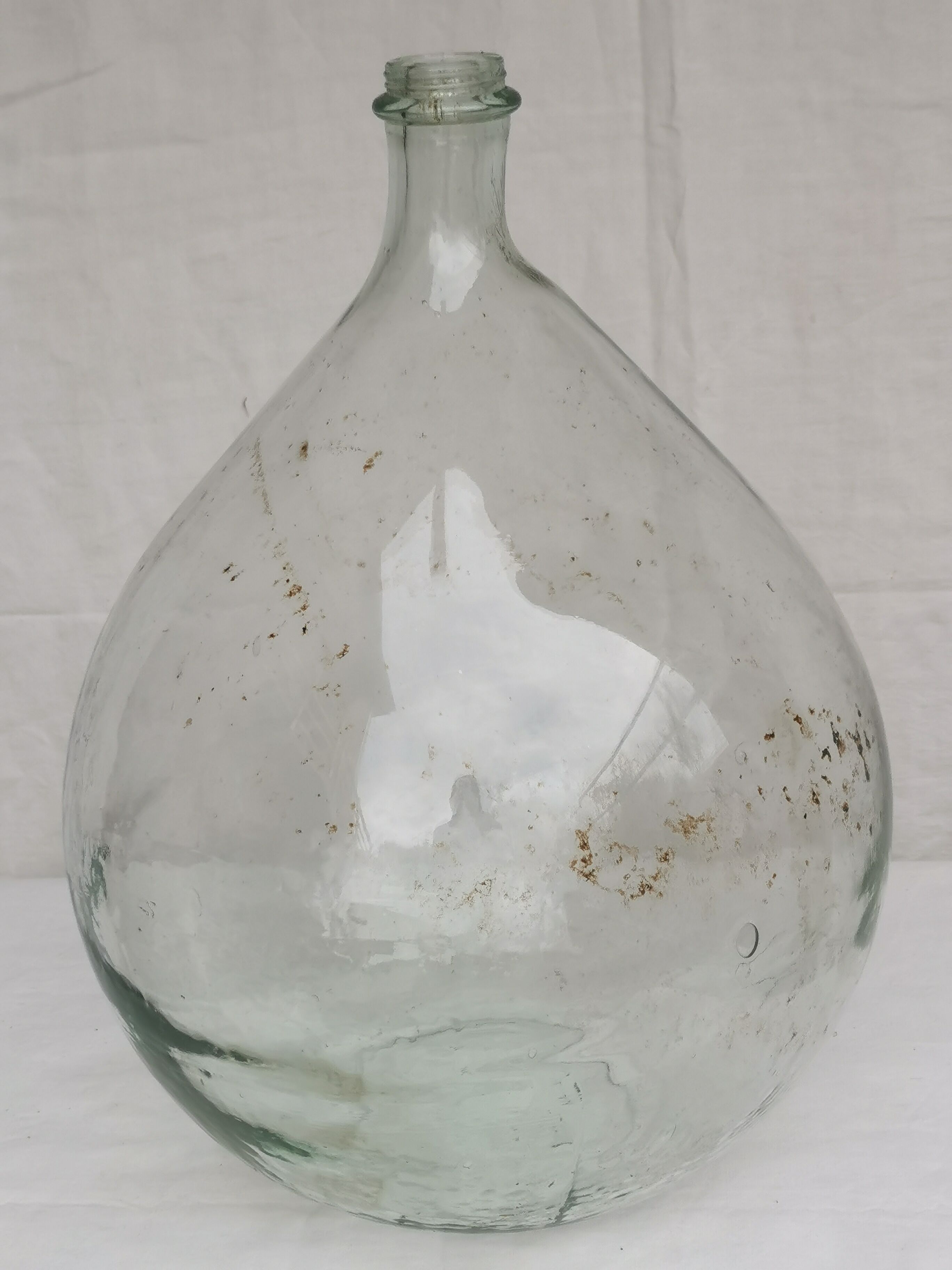 Large old lady Jeanne in transparent glass