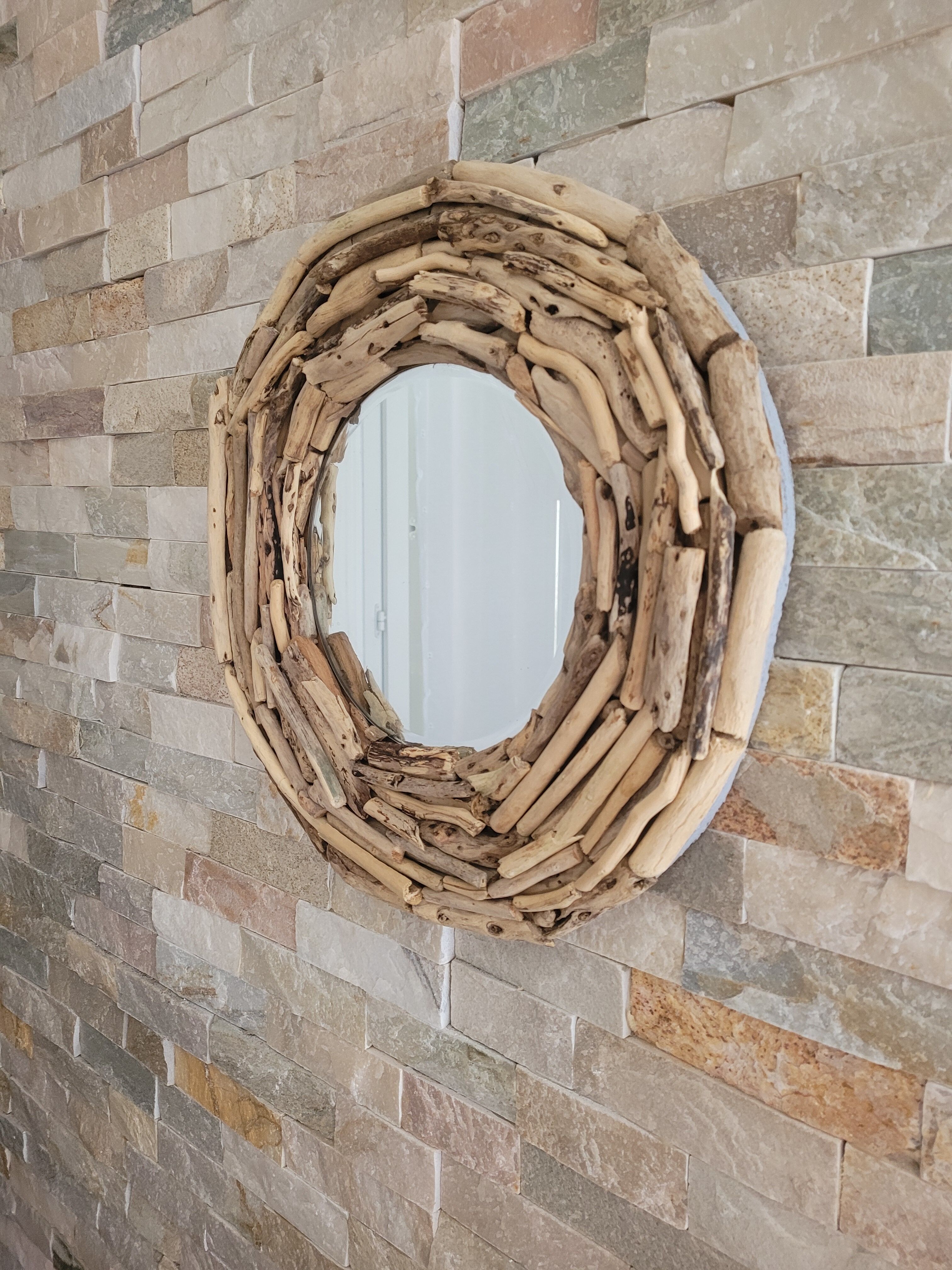 Very nice driftwood mirror.