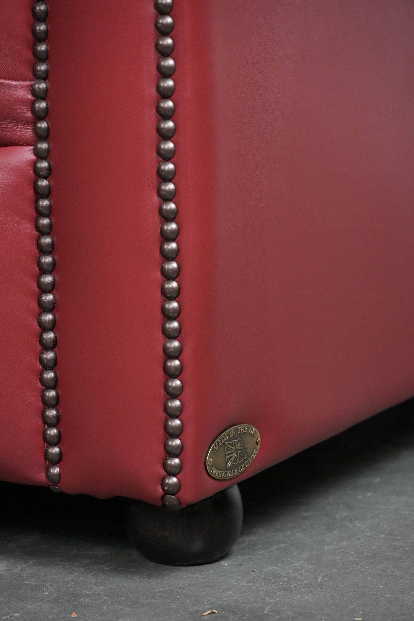 English cowhide Chesterfield 2.5-seater sofa in a stunning red colour