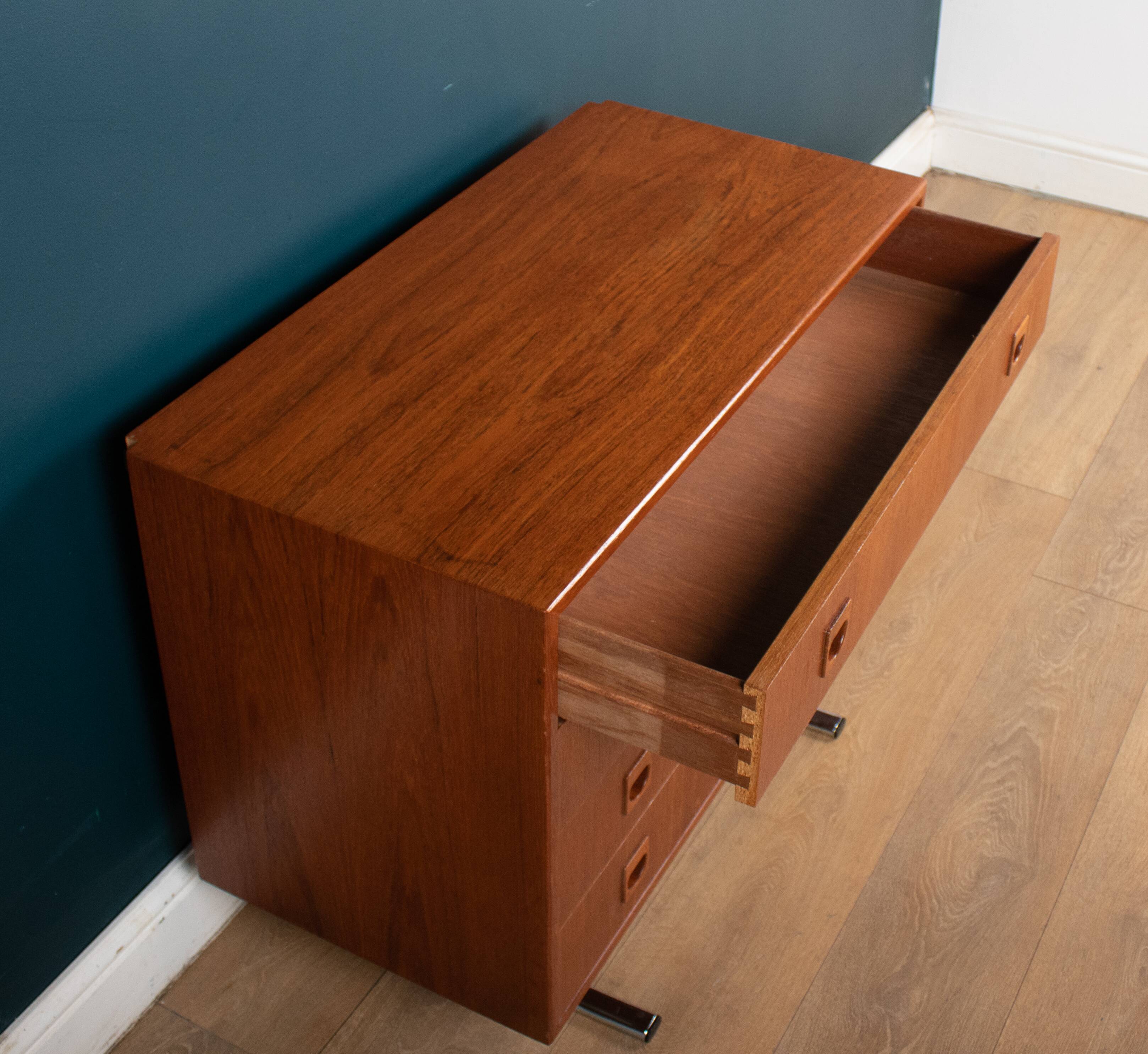 Retro teak 1960s danish chest of drawers on metal legs
