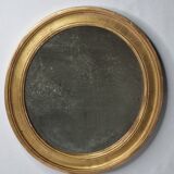 Antique round mirror in gilded wood, original patinated glass from the 19th century, 34 x 37 cm.