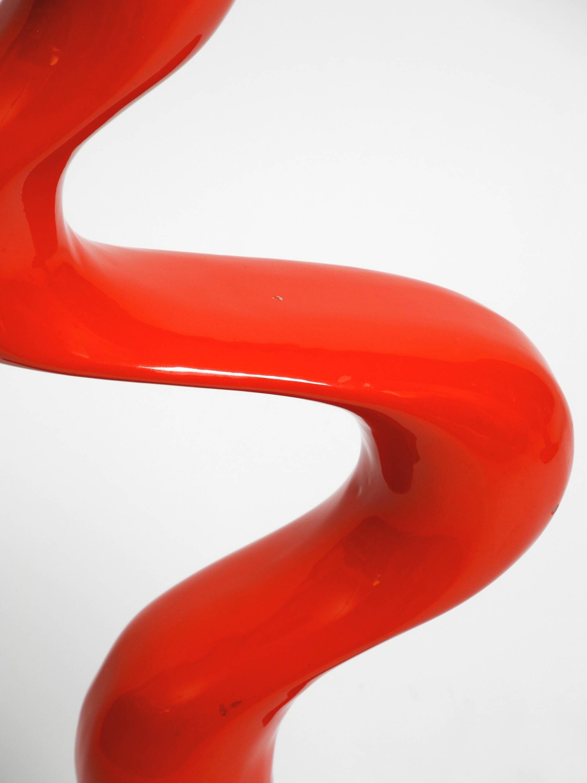 Two large limited abstract metal floor sculptures in red