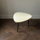 Tripod coffee table with floral design from the 1950s in brass metal and decorative top.