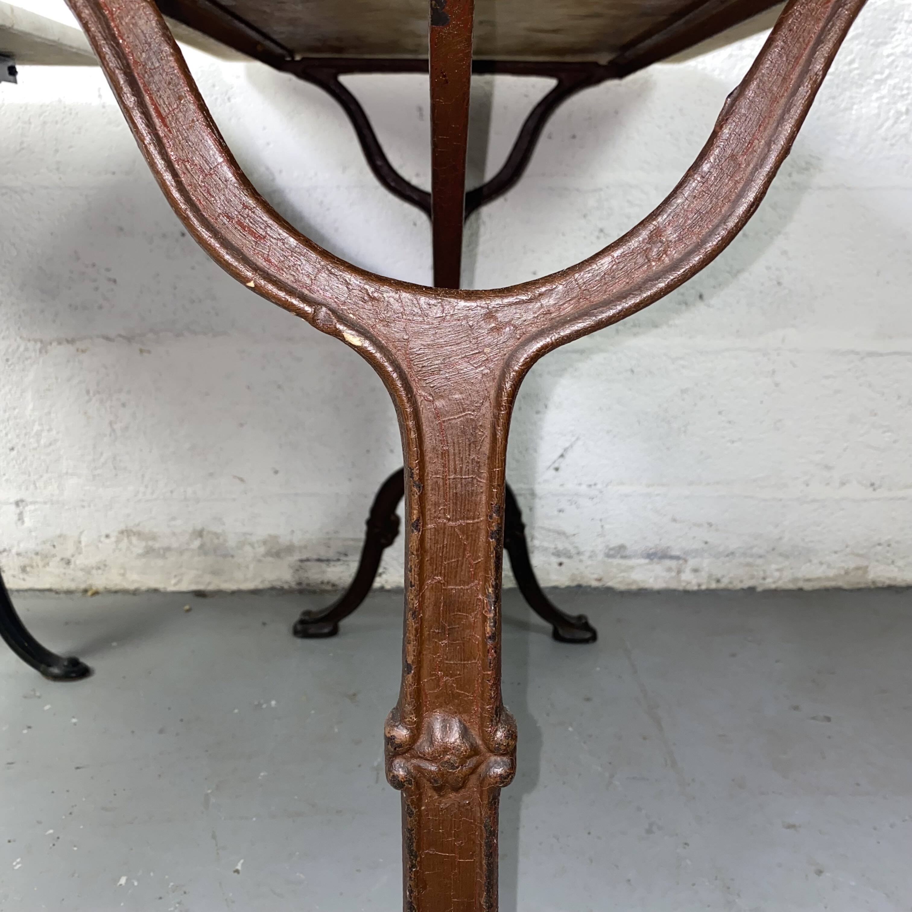 Set of two bistro tables in marble and wrought iron