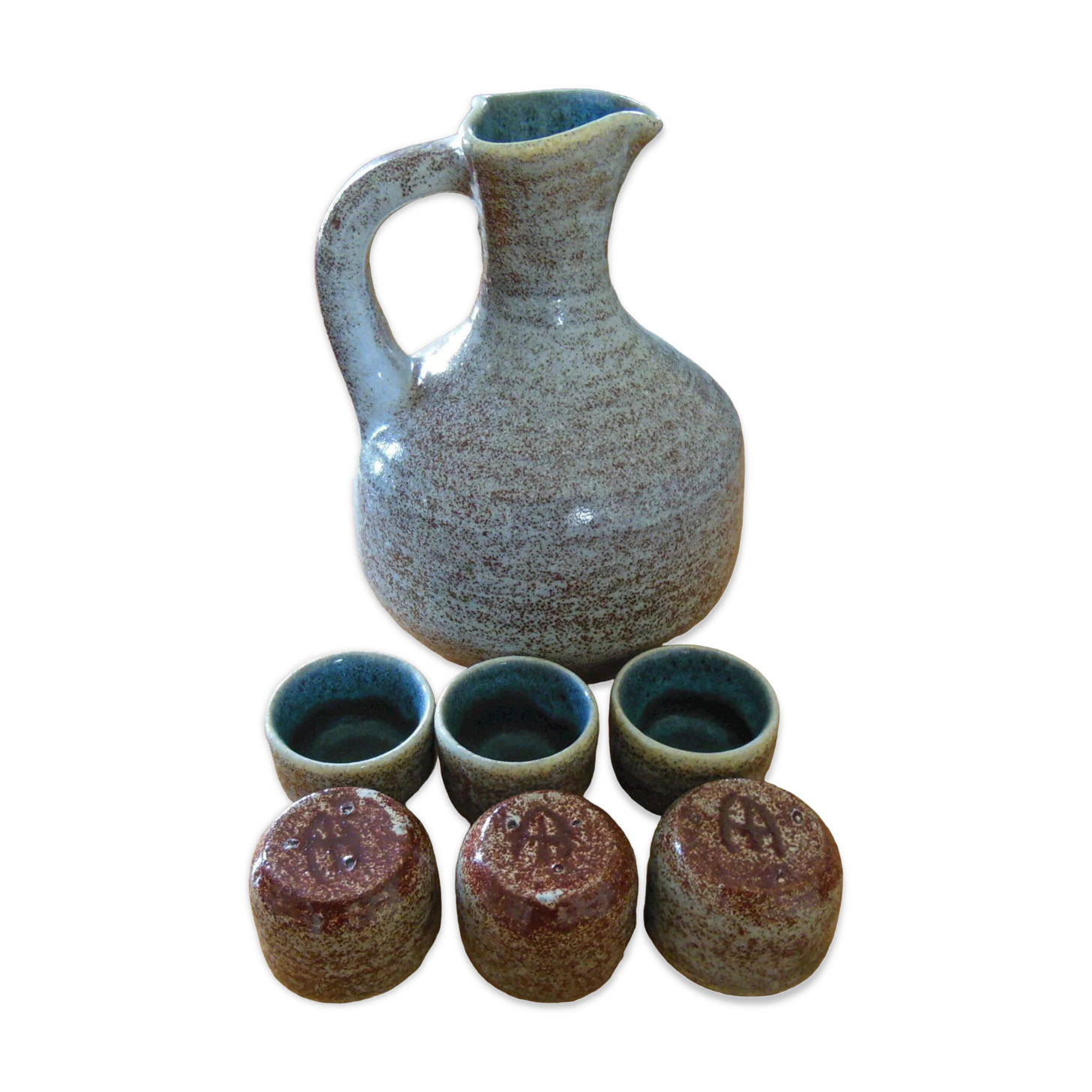 Pitcher and its 6 small ceramic cups sign Accolay