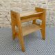 Light wood side table magazine rack