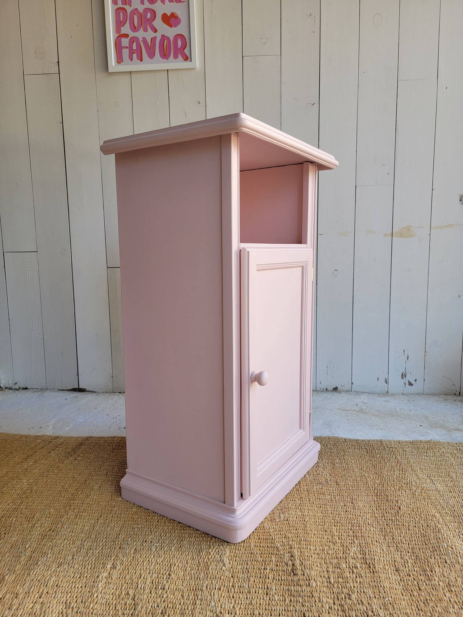 Antique bedside table revamped in pink.