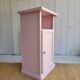 Antique bedside table revamped in pink.