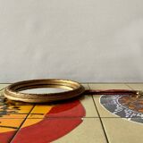 Small vintage wall mirror in gold painted wood