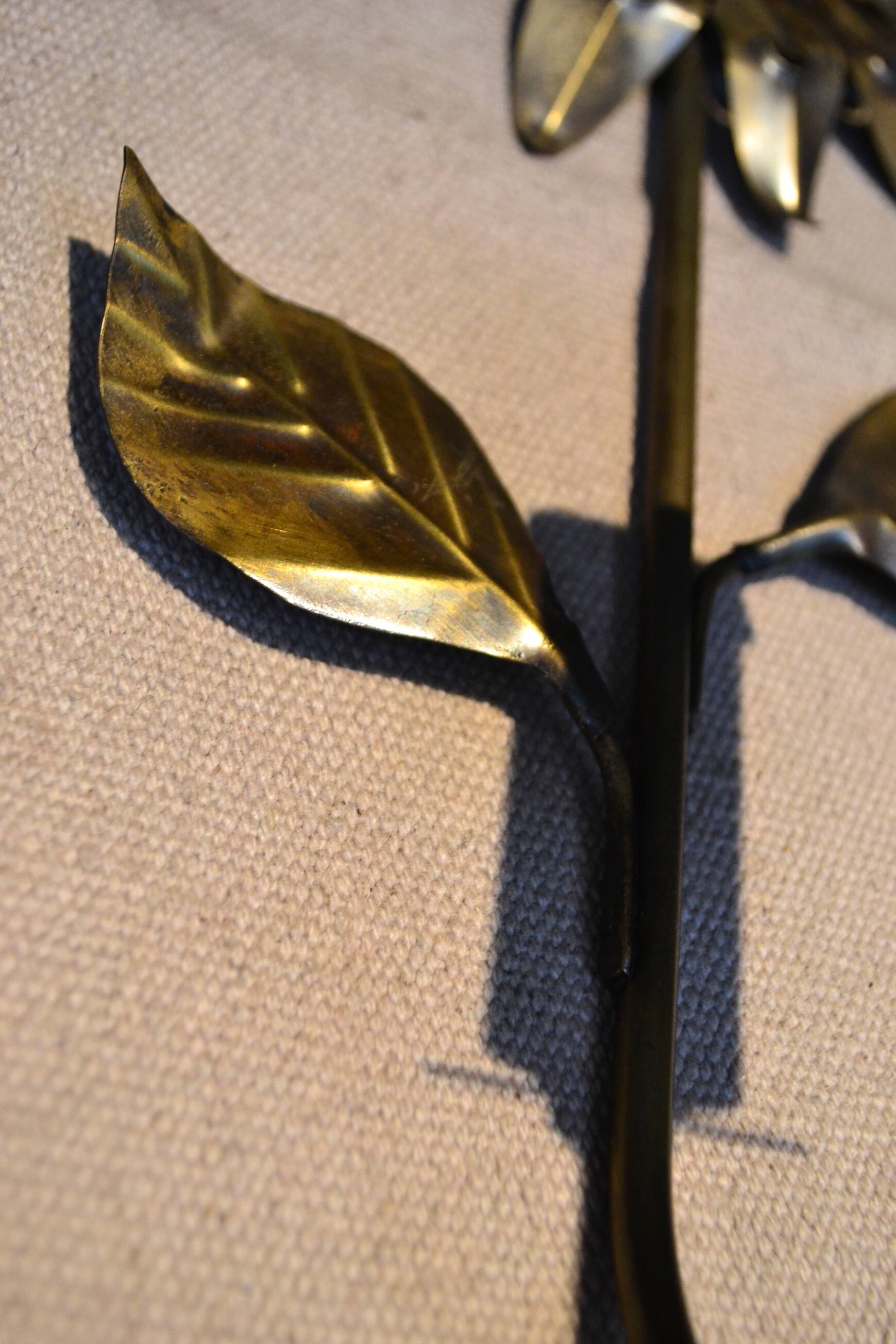 Brass flower wall light from the 1970s.