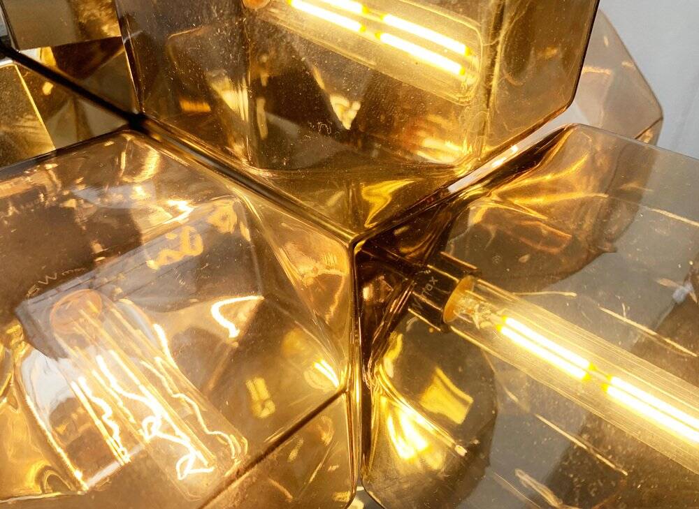 Vintage German wall or ceiling lamp from the space age in chrome and glass by Motoko Ishii for Staff, 1970s.