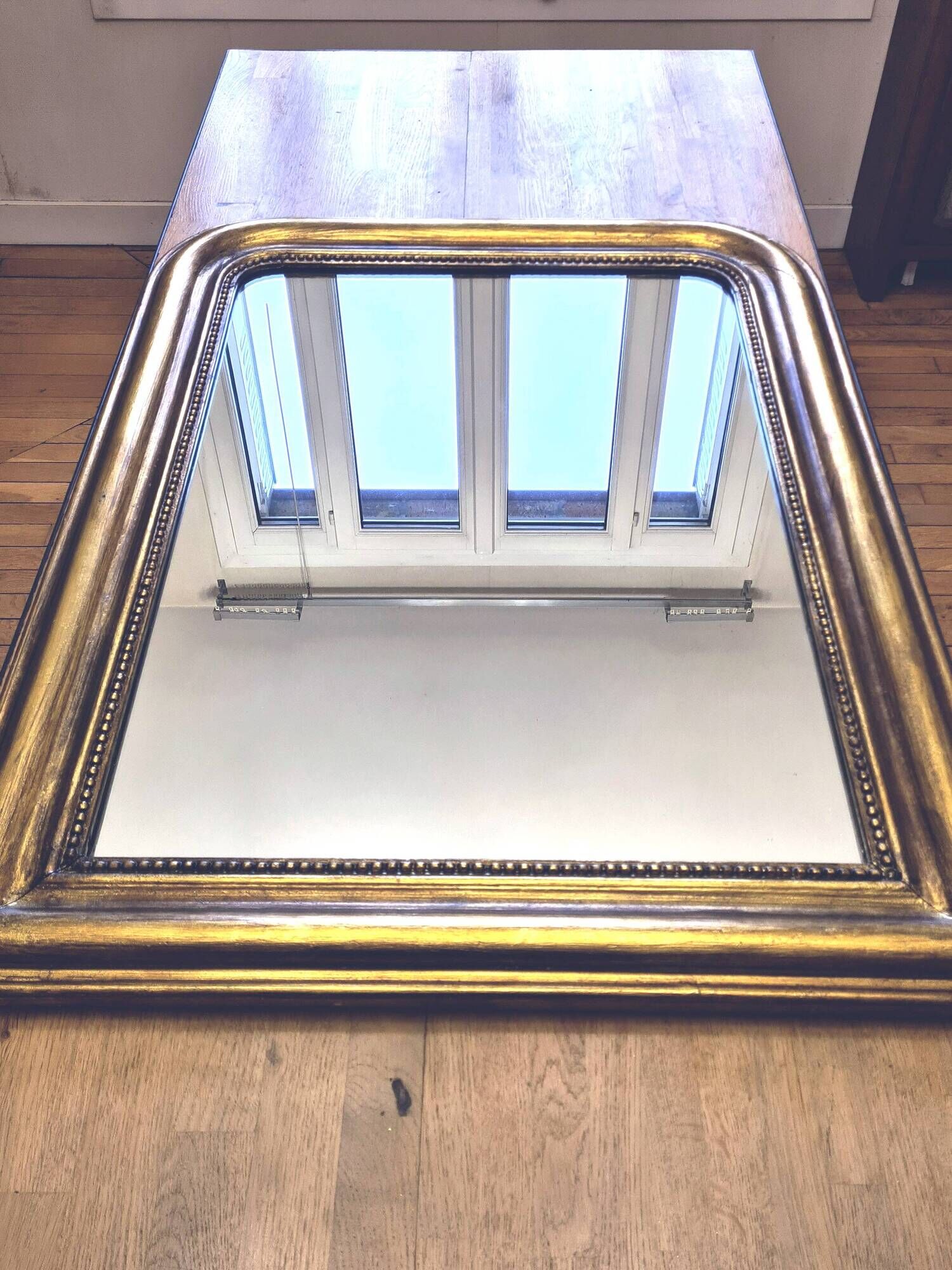 Old large Louis Phillipe mirror, gilded with gold leaf - Emilien"