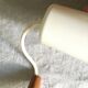 Suspension in opaline glass and teak by Louis Kalff for Philips