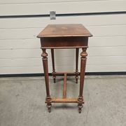 Antique dressing table with floral marquetry and integrated mirror.