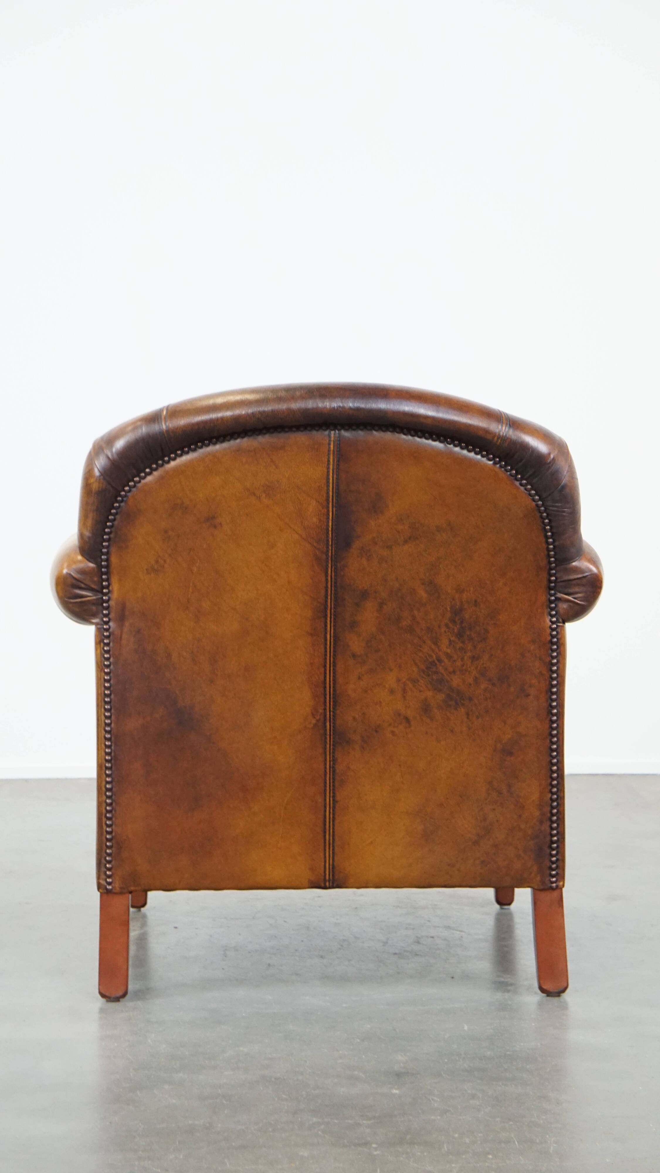 Cowhide Leather Armchair with Deep Warm Colors