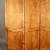 Large cherry wood folding screen with four double-sided panels.