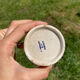 Duo of old beige Veillard Bordeaux coffee cups