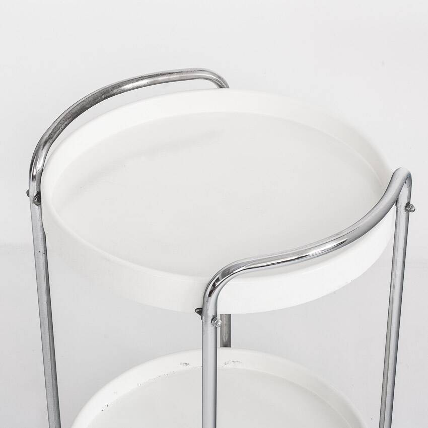 Vintage side table on casters. Chrome-plated iron and plastic. France, 1970s