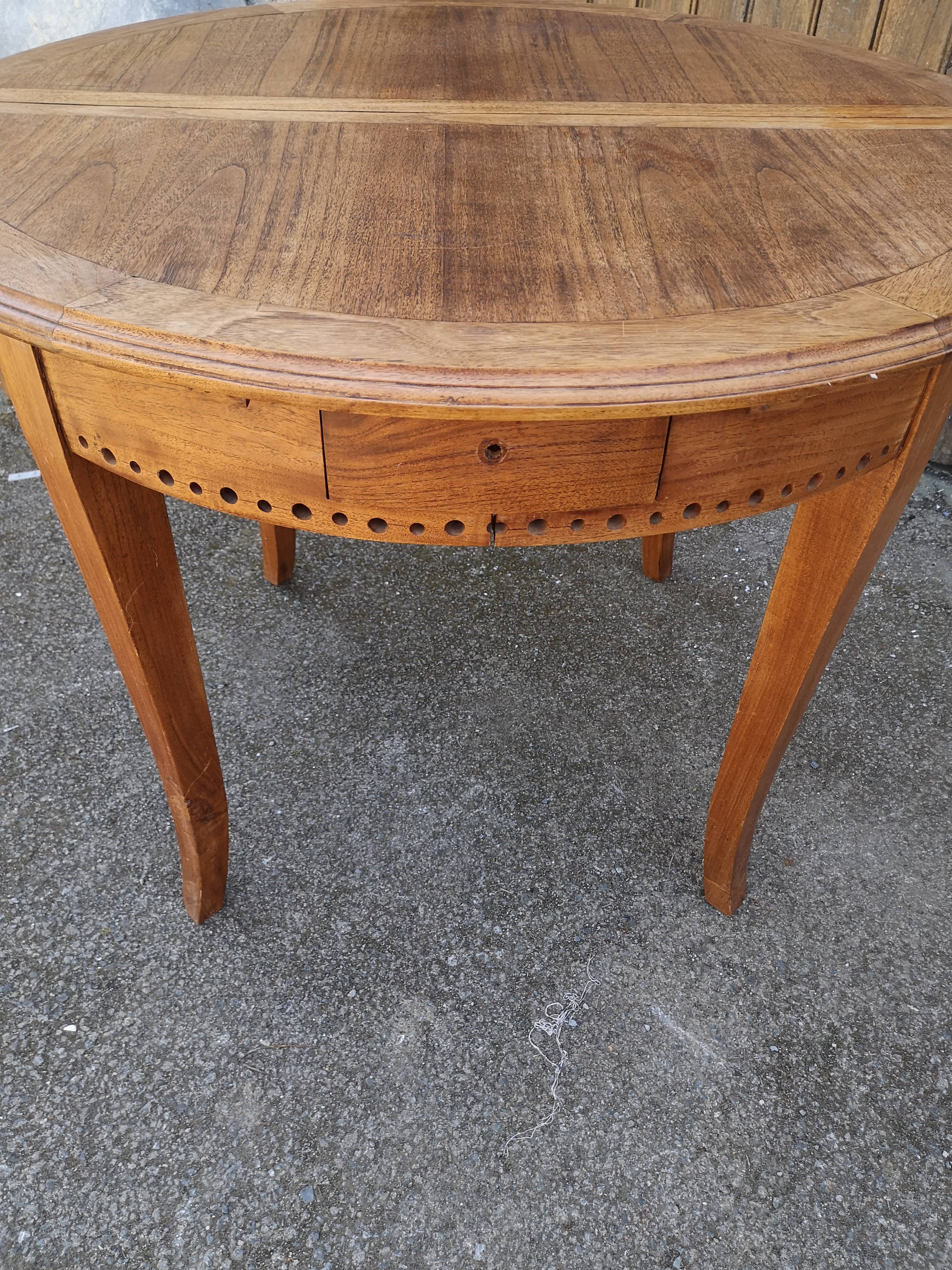 Teak dining table