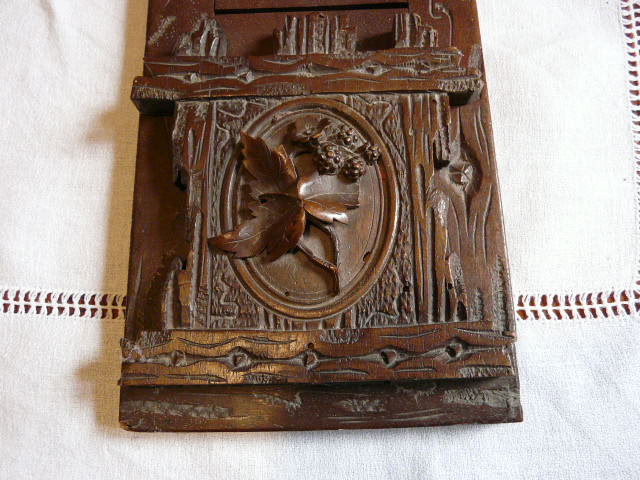 Ancien serre livre extensible forêt noire décor floral