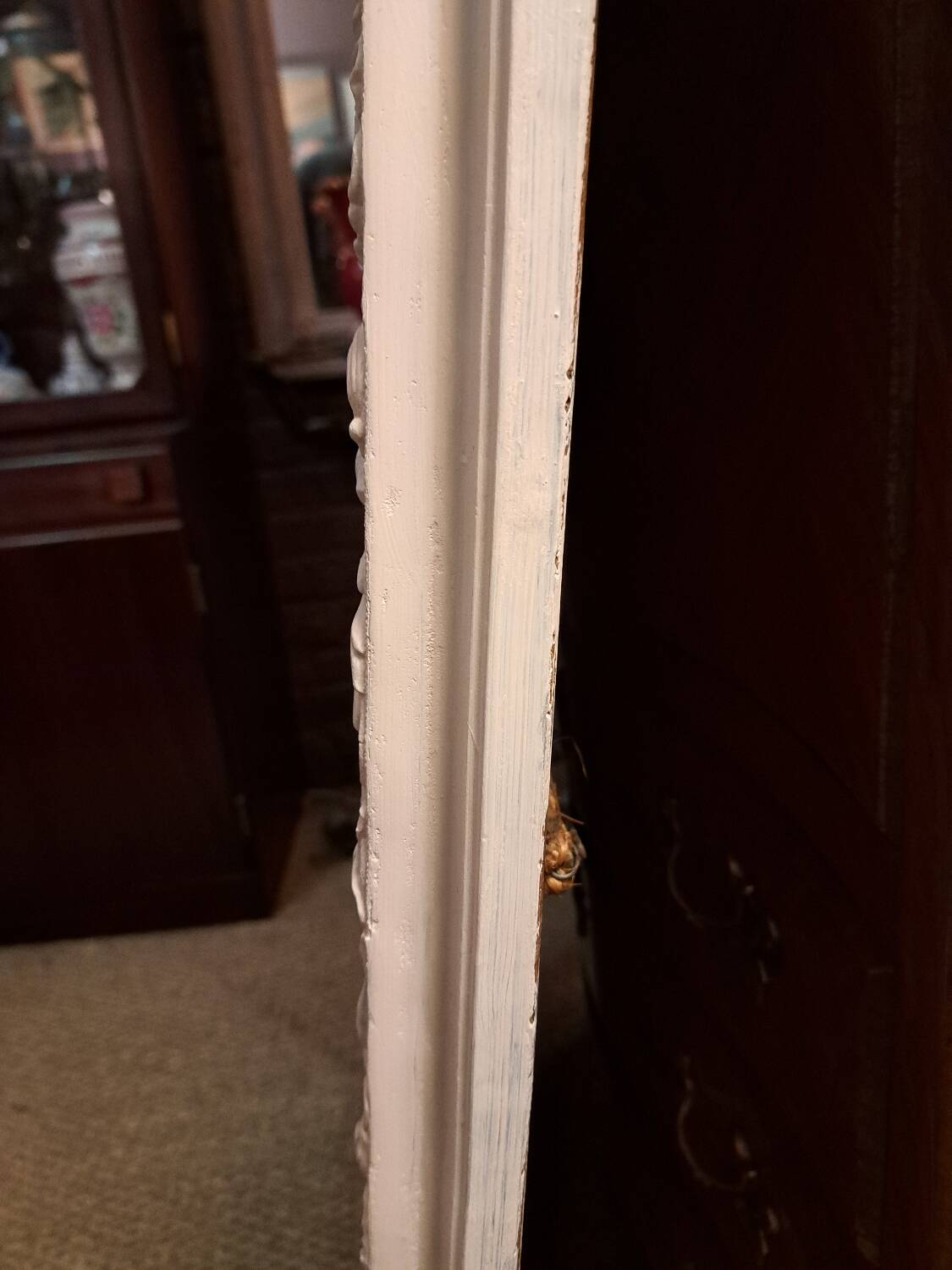 Louis Philippe mirror with patinated cartouche