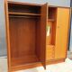 Scandinavian dressing cabinet with round mirror