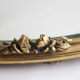 Golden oval mirror