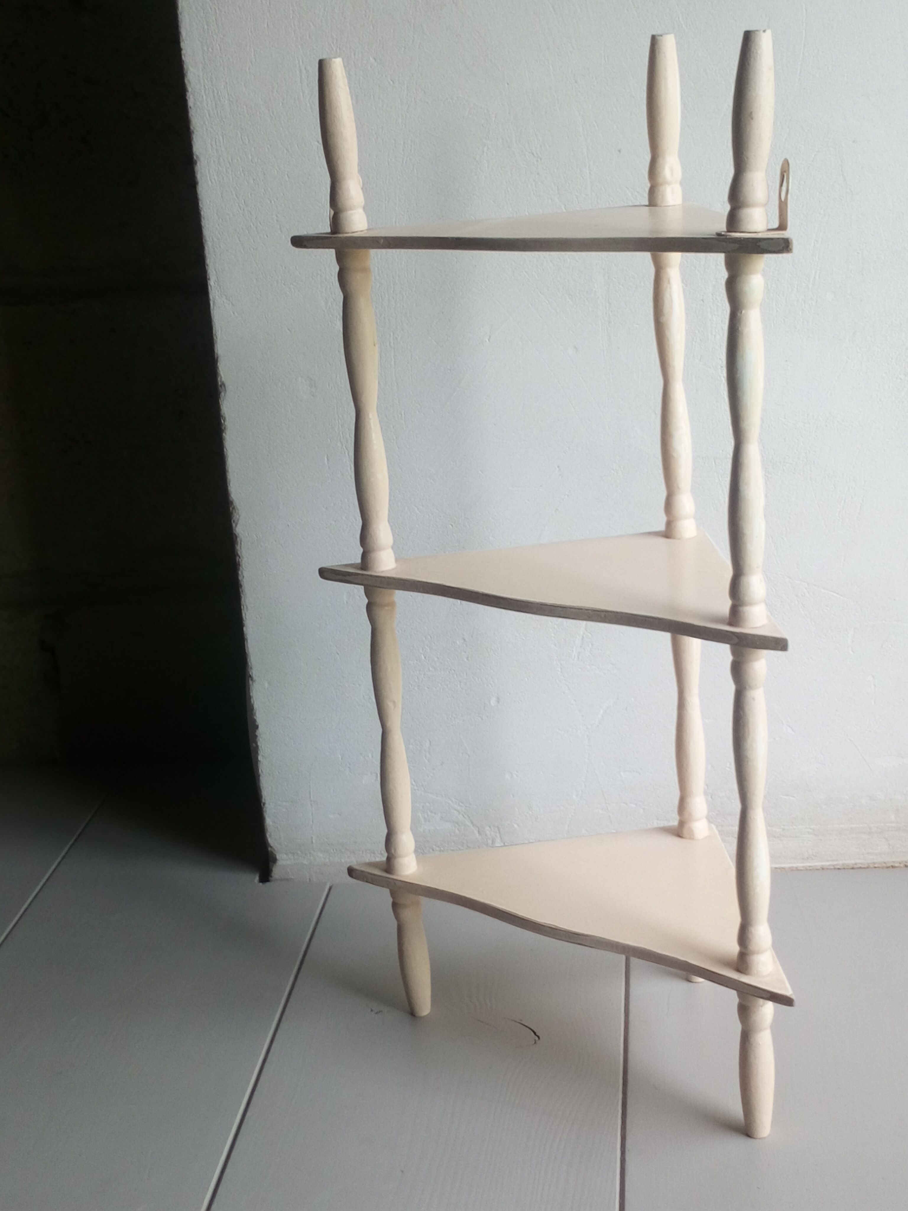 Old corner wall shelf turned wood