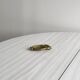 Gold metal owl pocket emptier