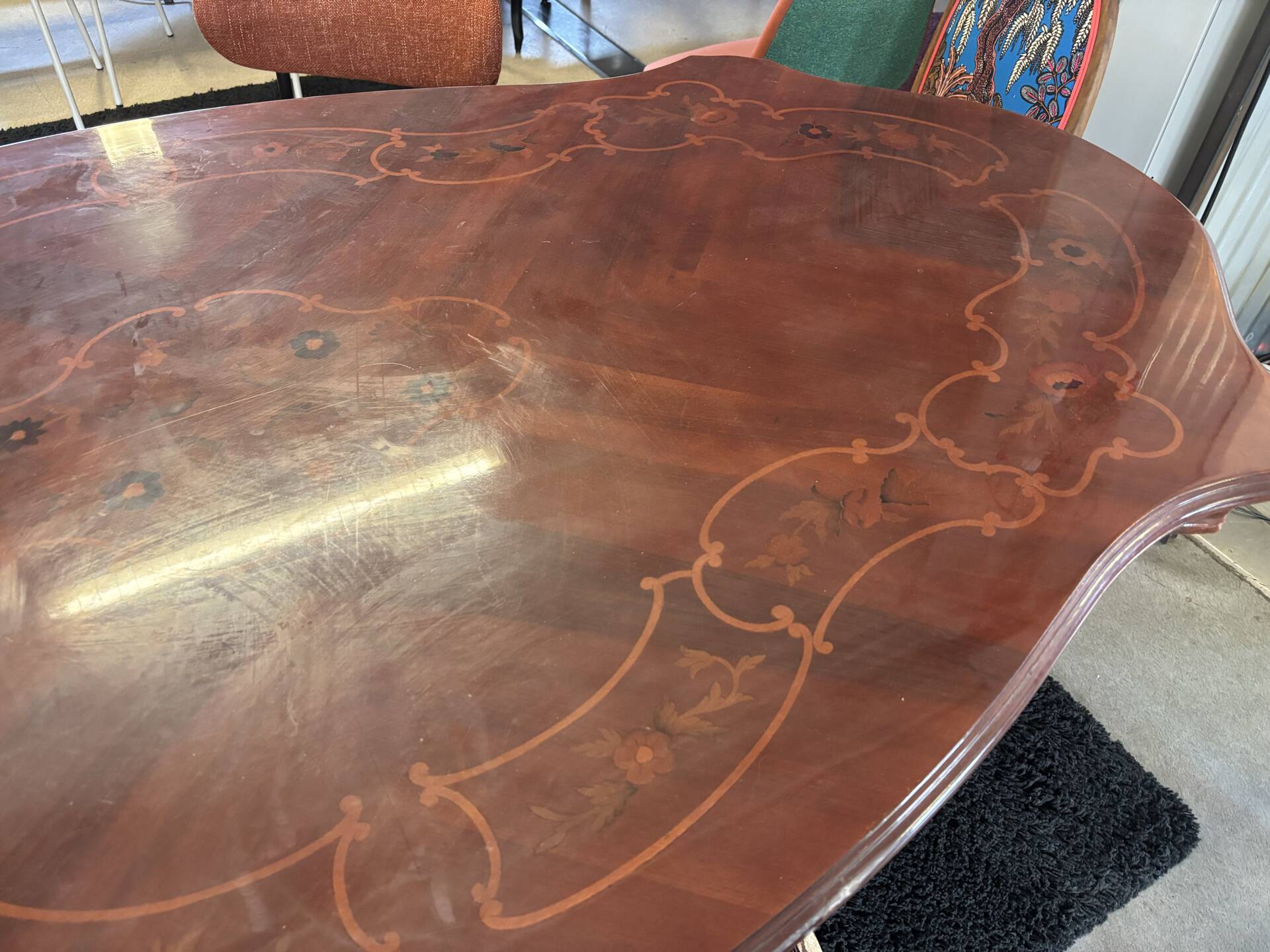 Oval table with marquetry top