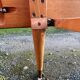 Read a vintage wooden and cane bed, with compass legs – mattress 80 × 190 cm.