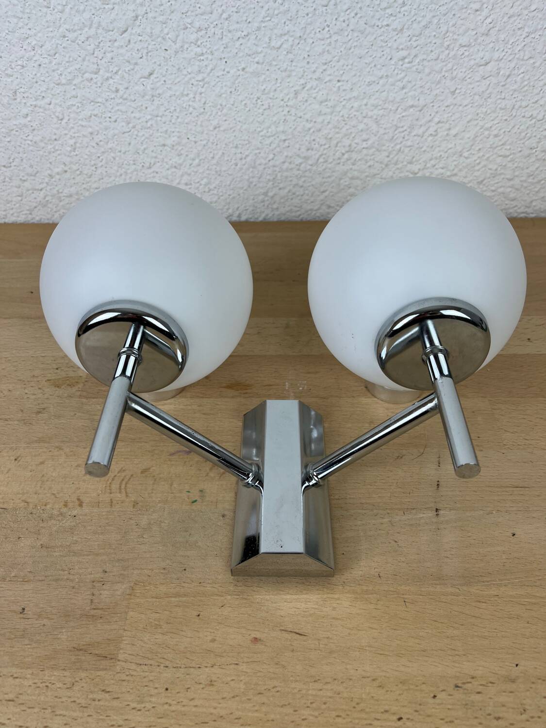 Opaline and chrome globe wall light from the 1970s