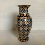 Chinese vase painted in relief