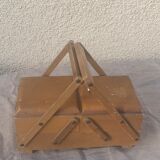 Sewing box in old varnished wood