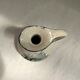 Old pitcher in Dutch-made earthenware signed