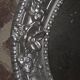 Louis xv style mirror with silver patinated shell