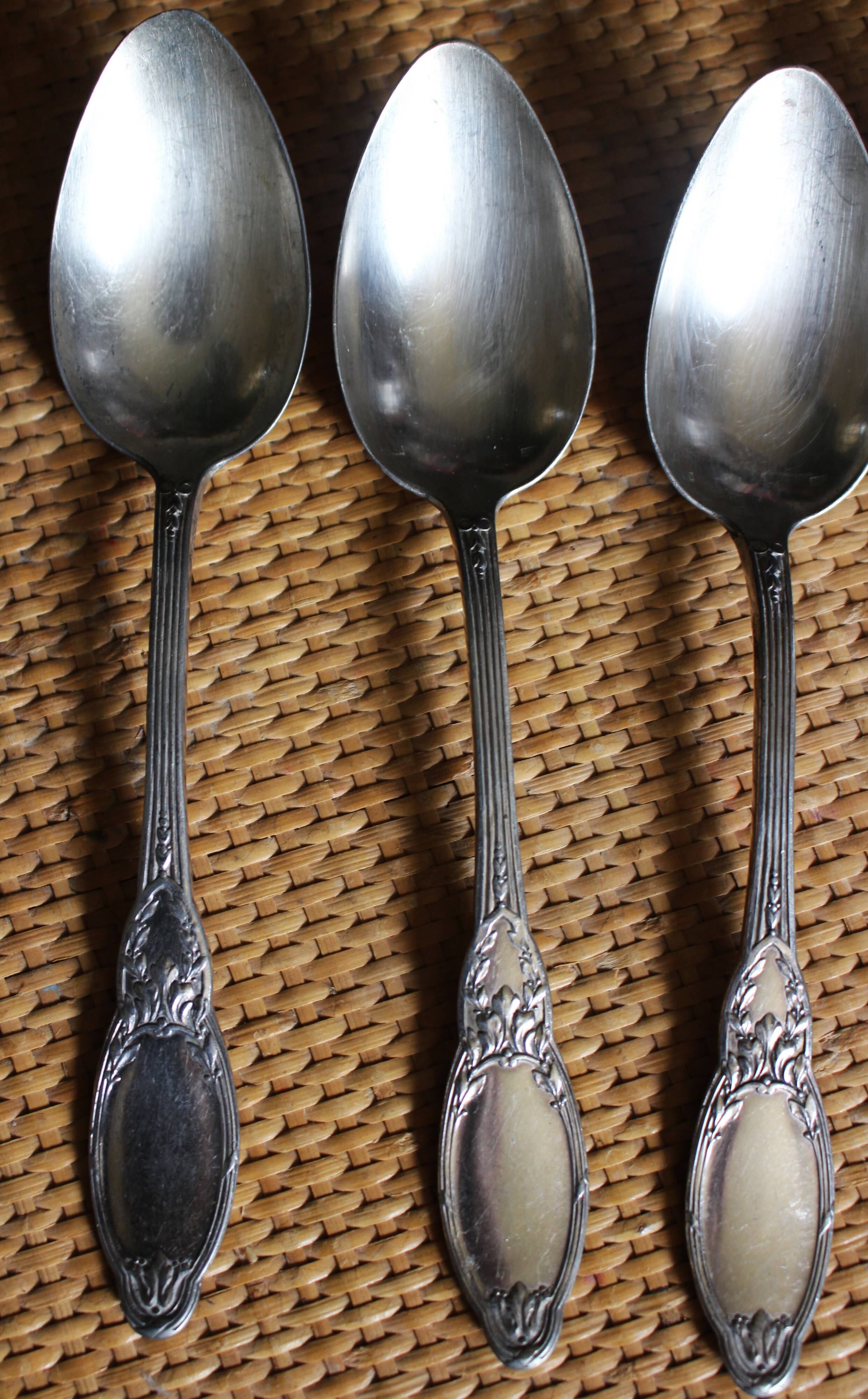 One of 6 silver-plated leafy metal soup spoons