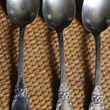 One of 6 silver-plated leafy metal soup spoons