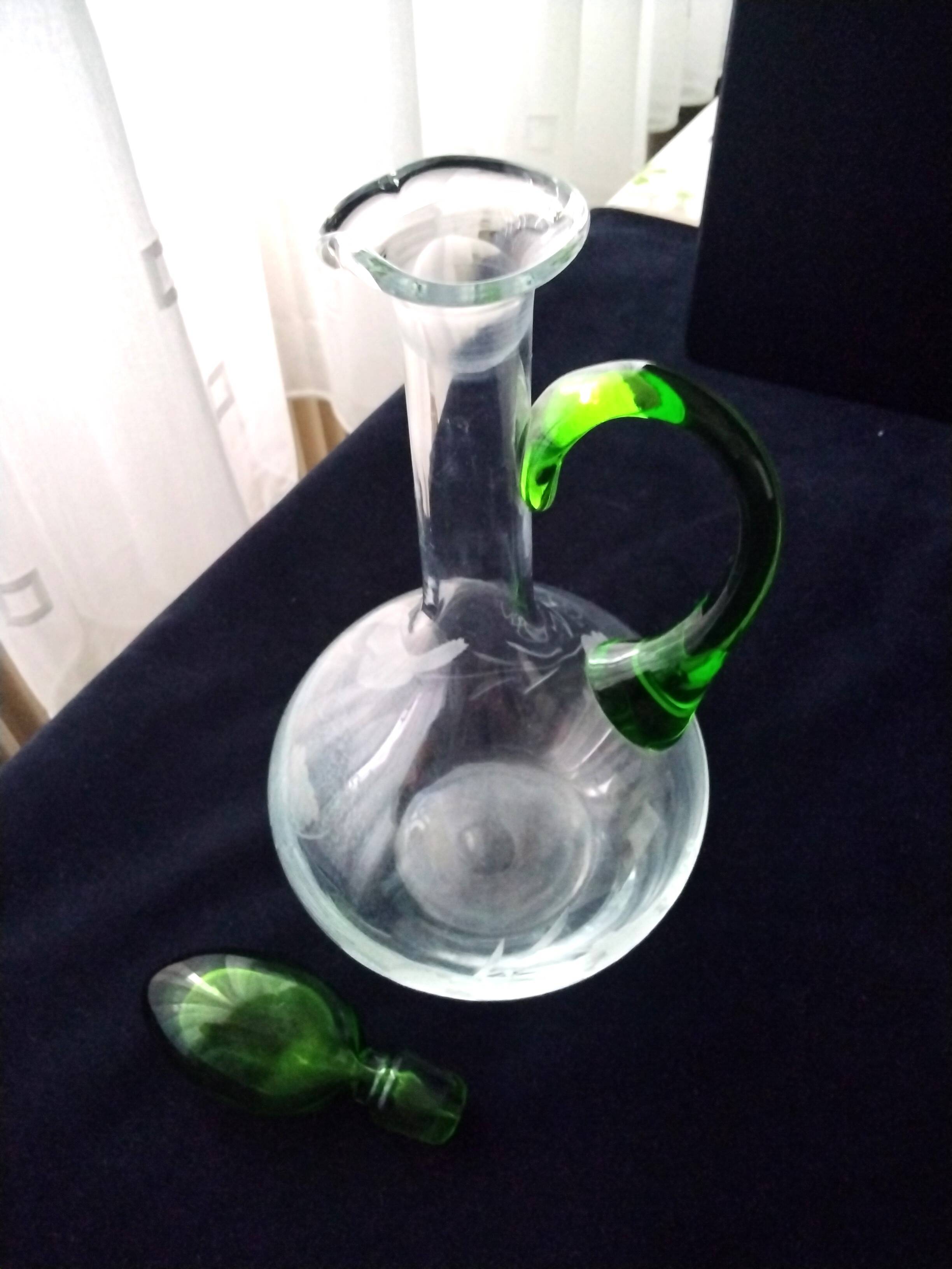 Blown glass wine carafe with engraved decoration