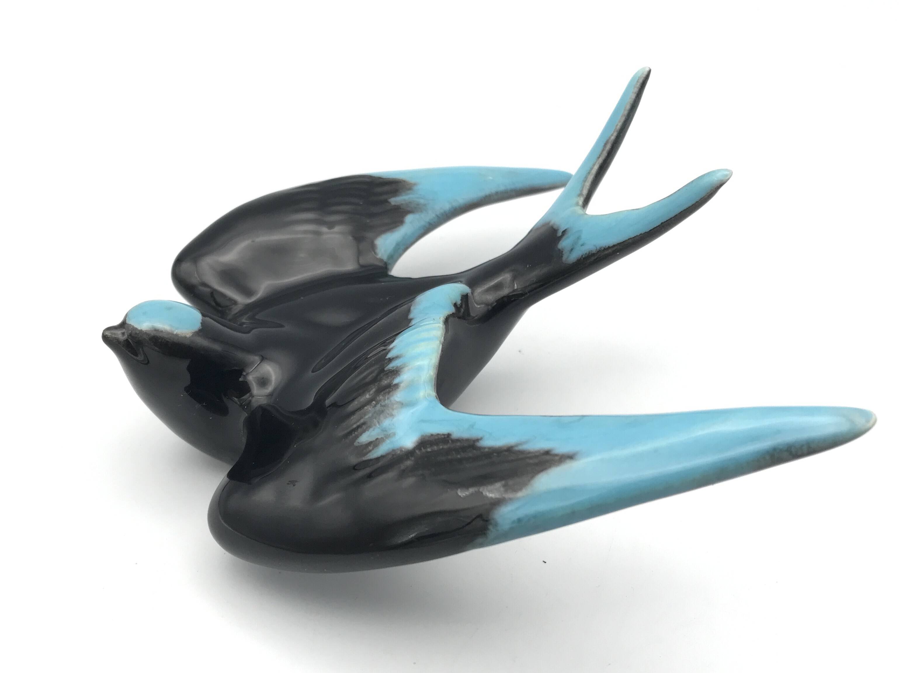 Vintage swallow in two-tone black and blue enameled ceramic