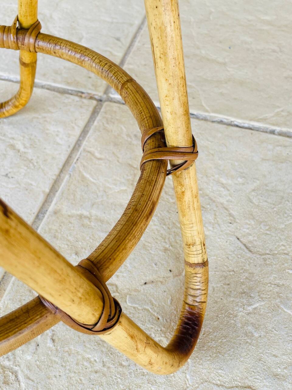 Vintage rattan and bamboo side table, circa 1969.
