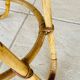 Vintage rattan and bamboo side table, circa 1969.