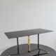 Coffee table in black glass lacquered brass and iron, Italy 50s