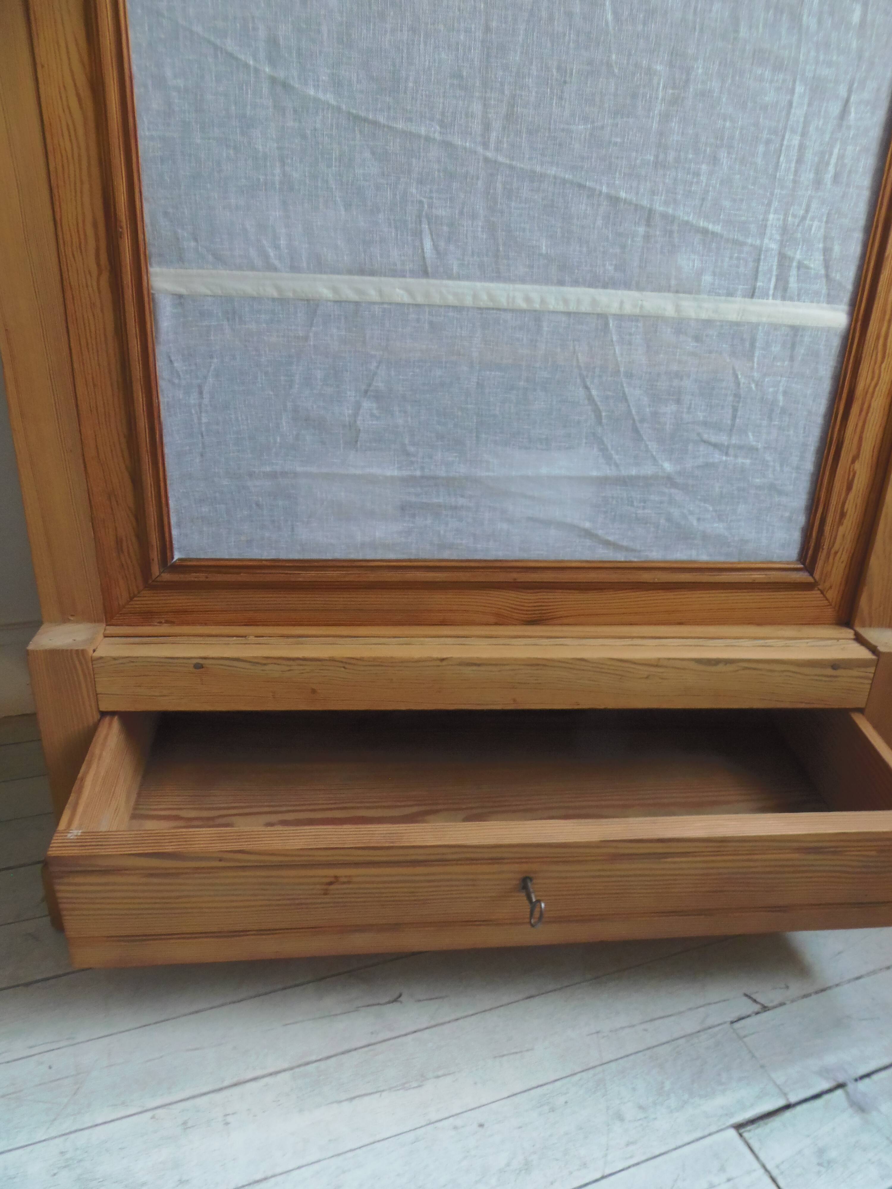 Lingerie, wardrobe, dresser from 1905 in pitch pine with a waxed finish.