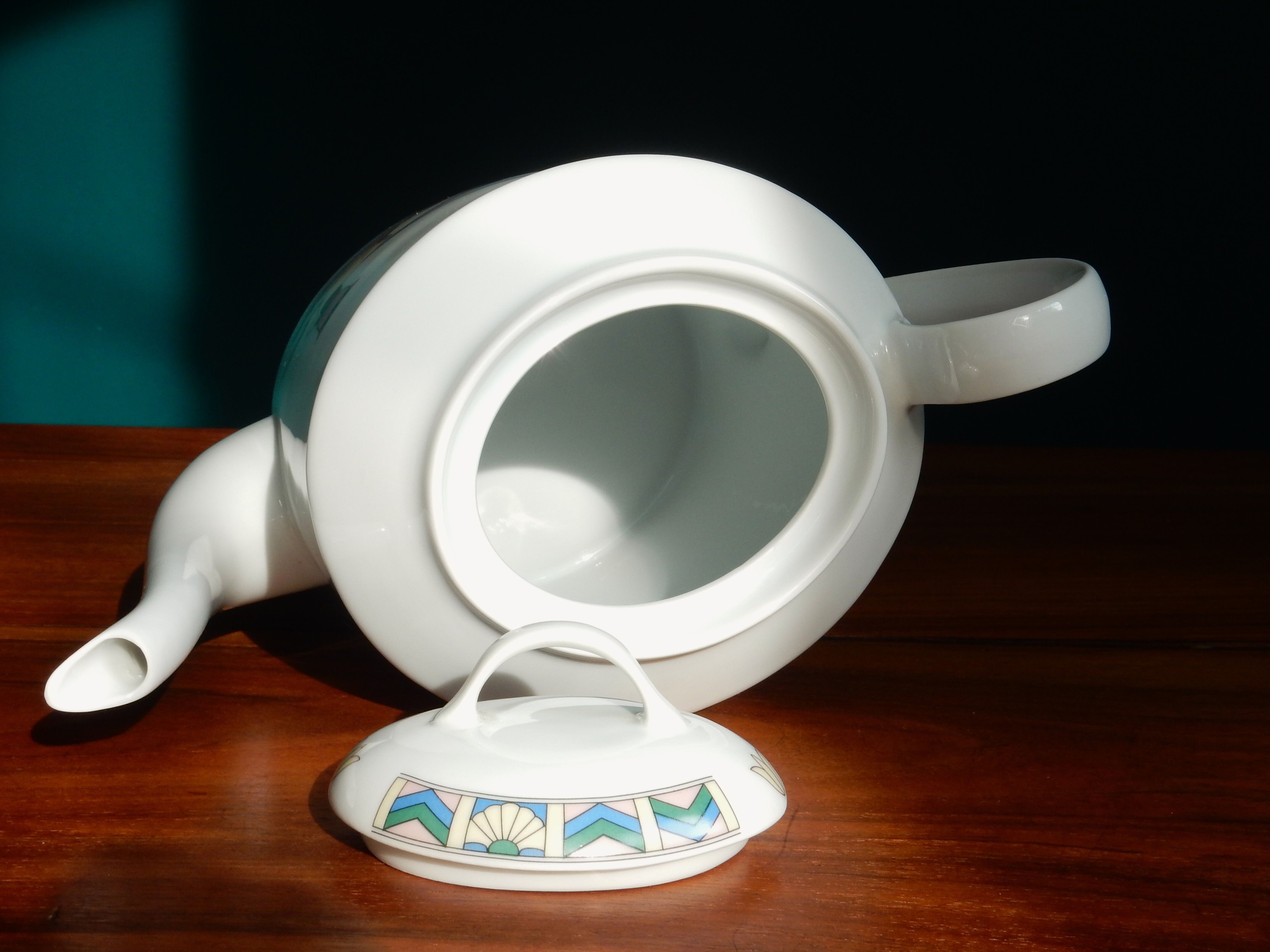 Limoges coffee maker inspired by ancient Egypt in the style of the 80s